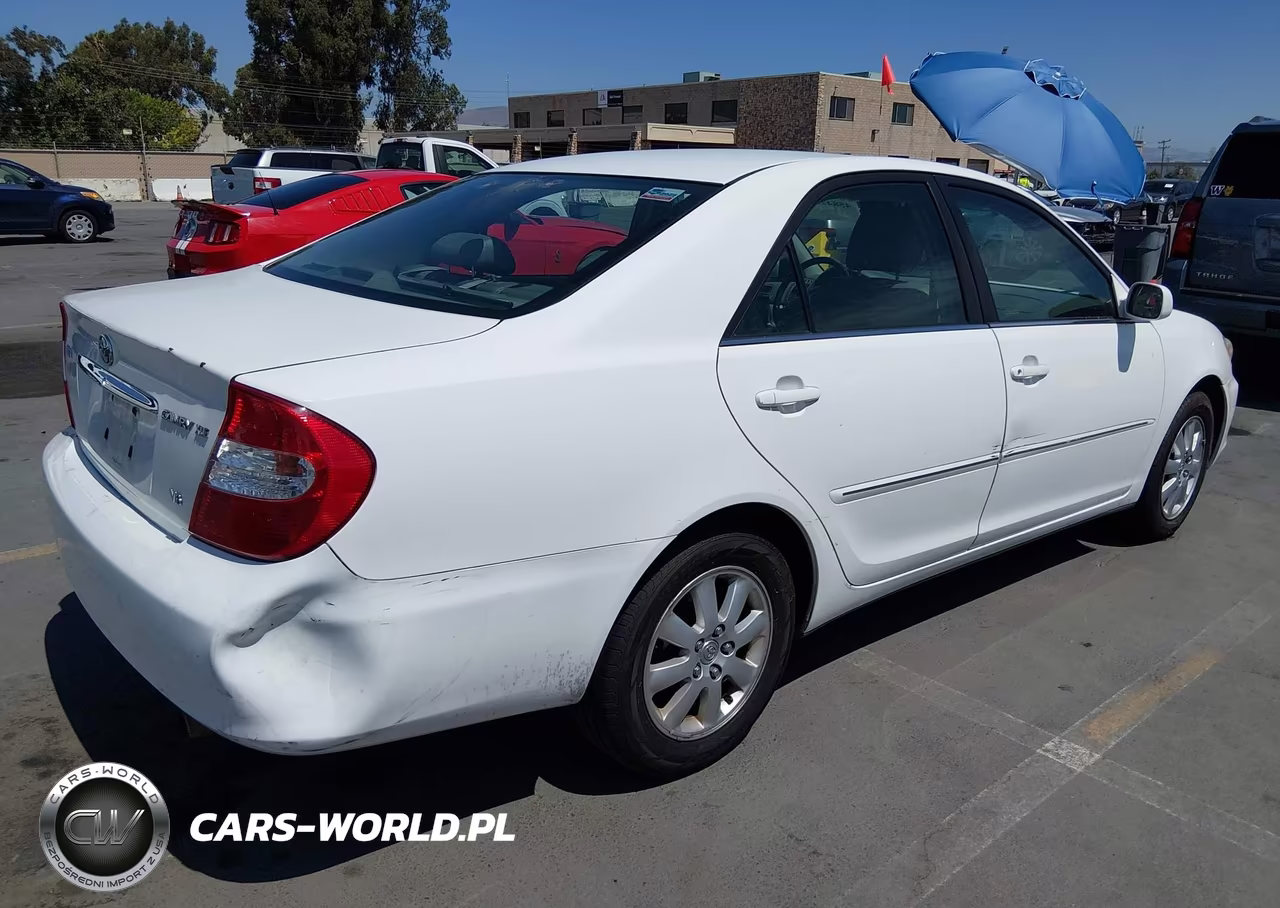 2002 Toyota Camry Xle VIN:JTDBF30K620006818 - 4