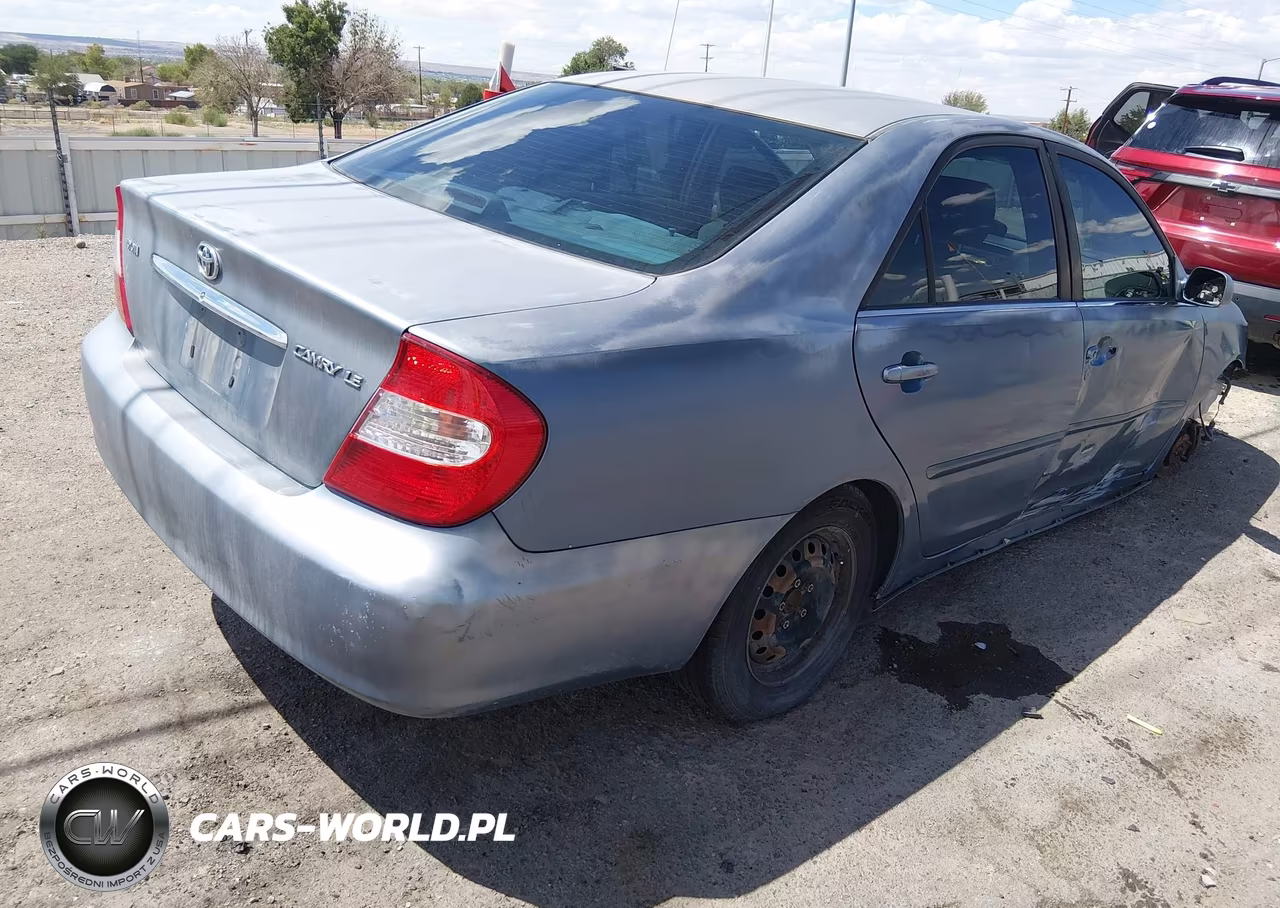 2002 Toyota Camry Le VIN:JTDBE32K120066439 - 4