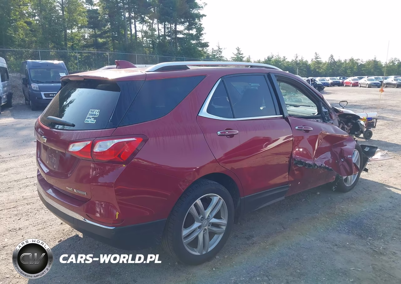 2018 Chevrolet Equinox Premier VIN:2GNAXVEV4J6102757 - 4