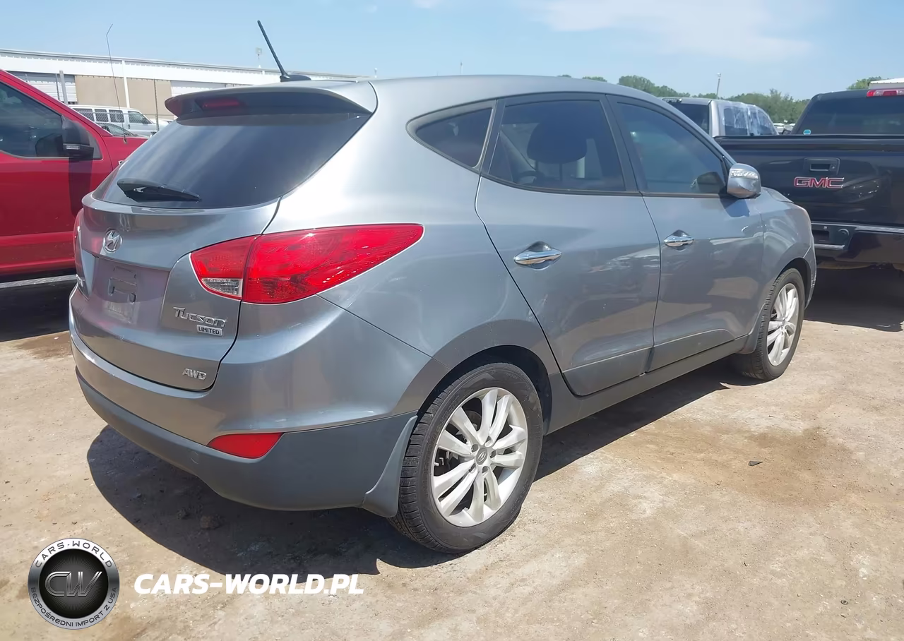 2011 Hyundai Tucson Limited VIN:KM8JUCAC0BU231930 - 4