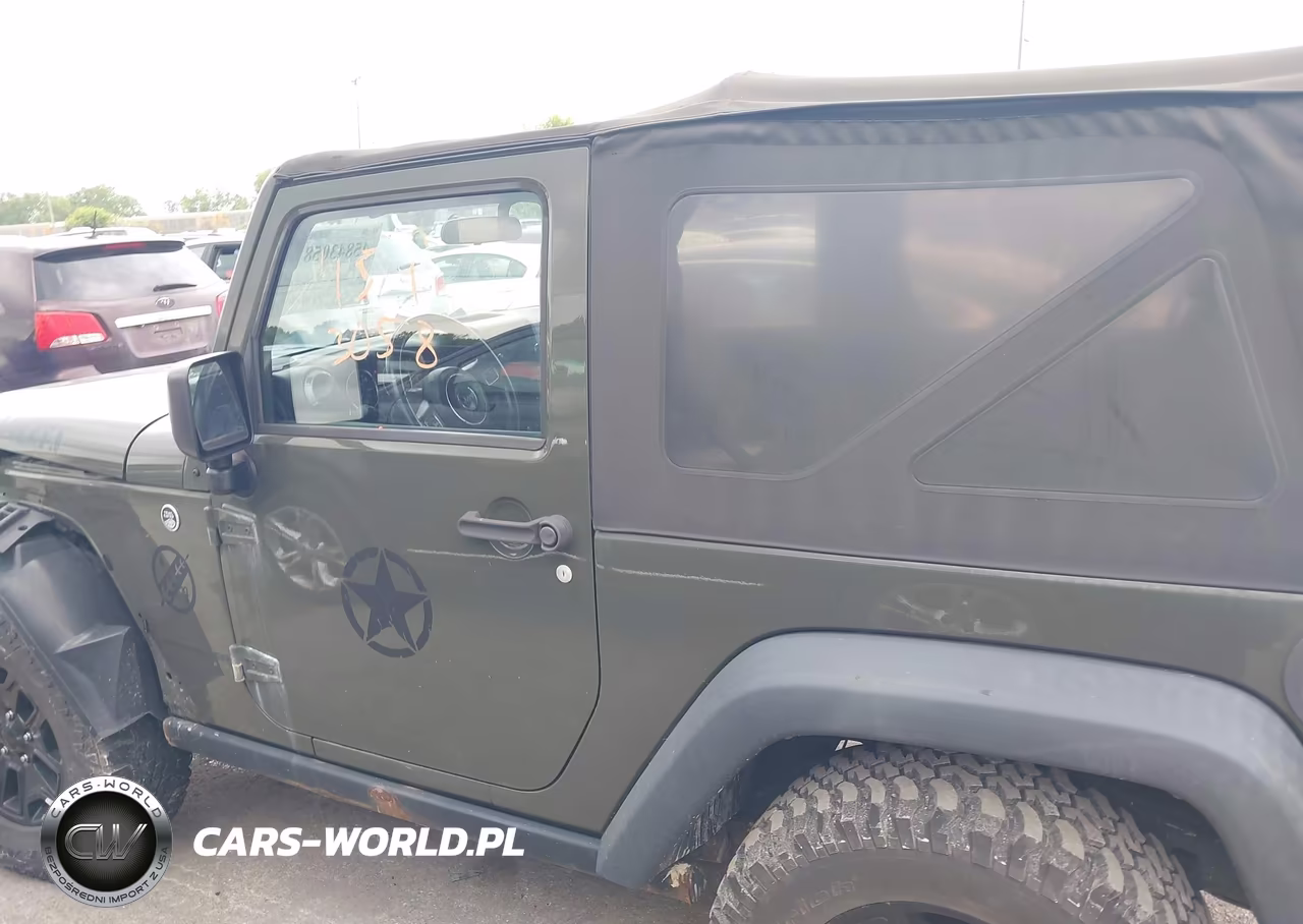 2015 Jeep Wrangler Willys Wheeler VIN:1C4AJWAG9FL592635 - 14