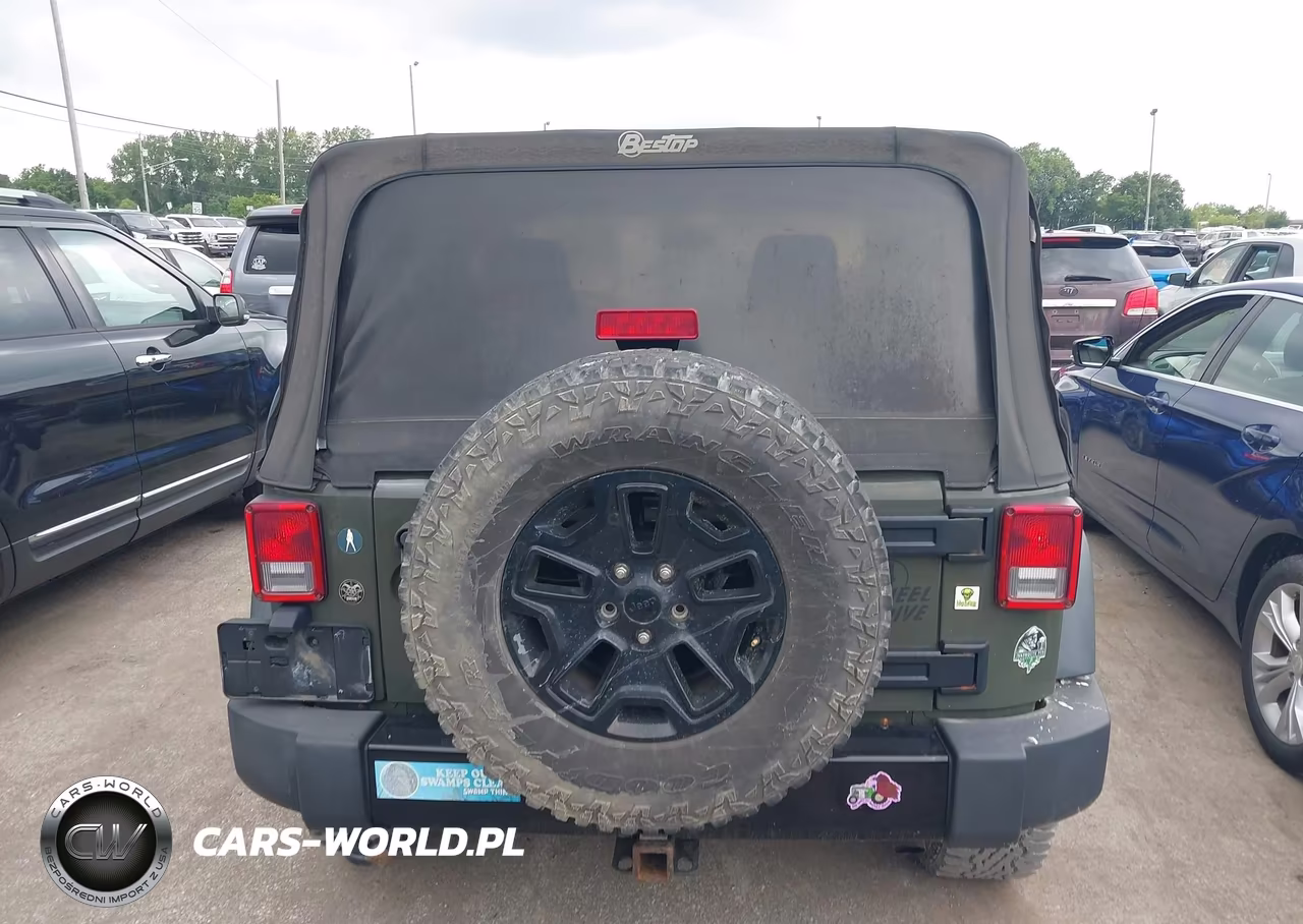 2015 Jeep Wrangler Willys Wheeler VIN:1C4AJWAG9FL592635 - 16