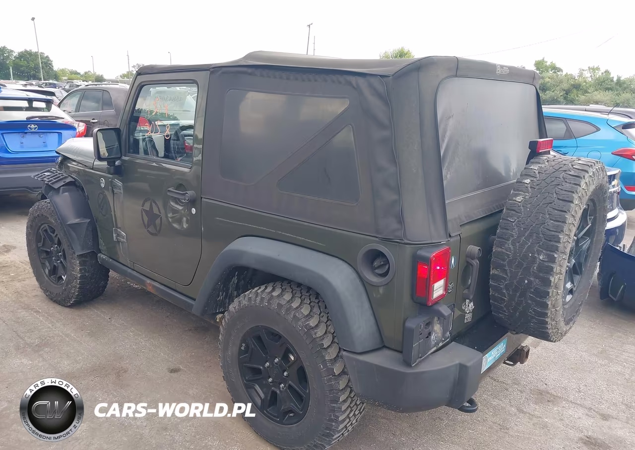 2015 Jeep Wrangler Willys Wheeler VIN:1C4AJWAG9FL592635 - 3