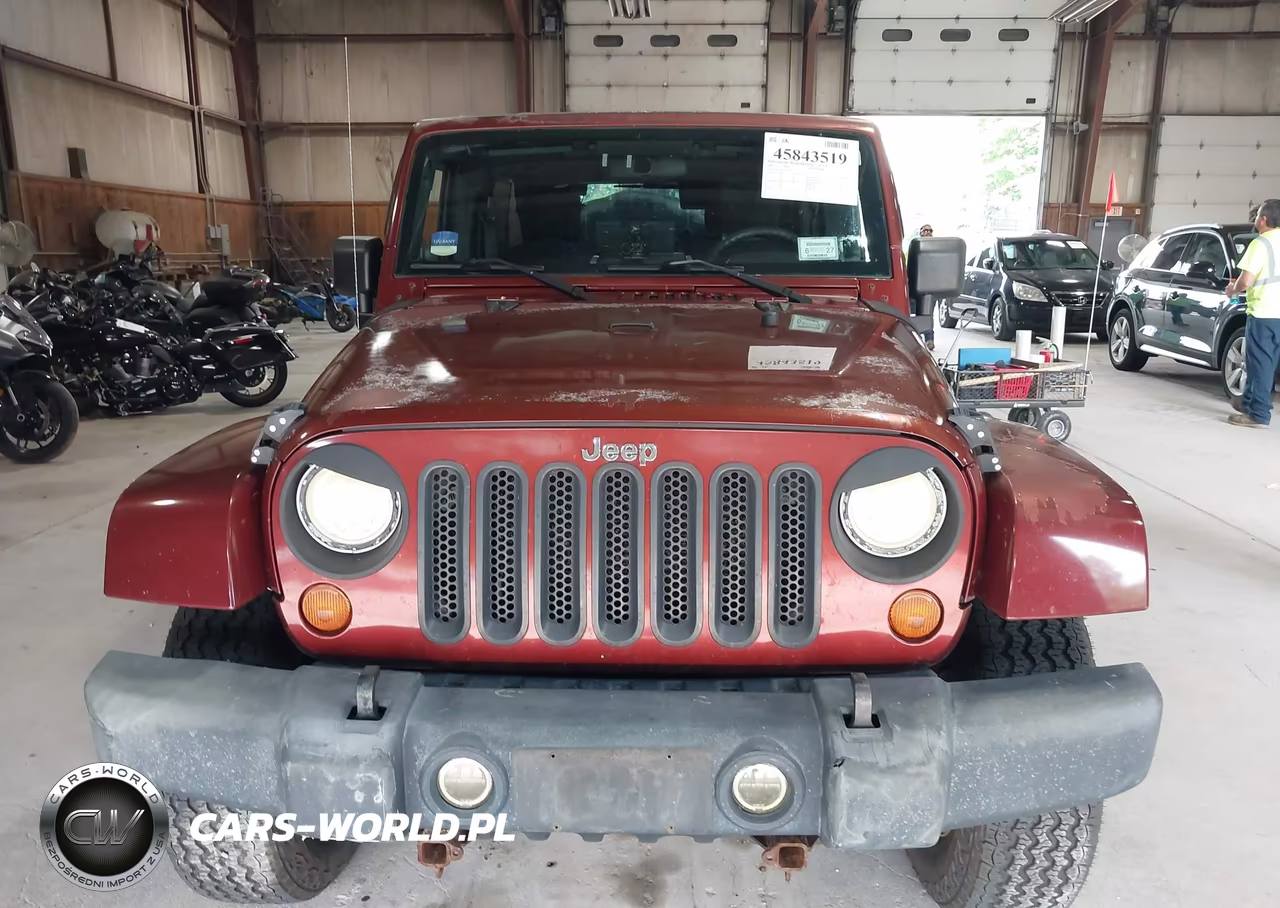 2007 Jeep Wrangler Unlimited Sahara VIN:1J4GA59177L113273 - 12