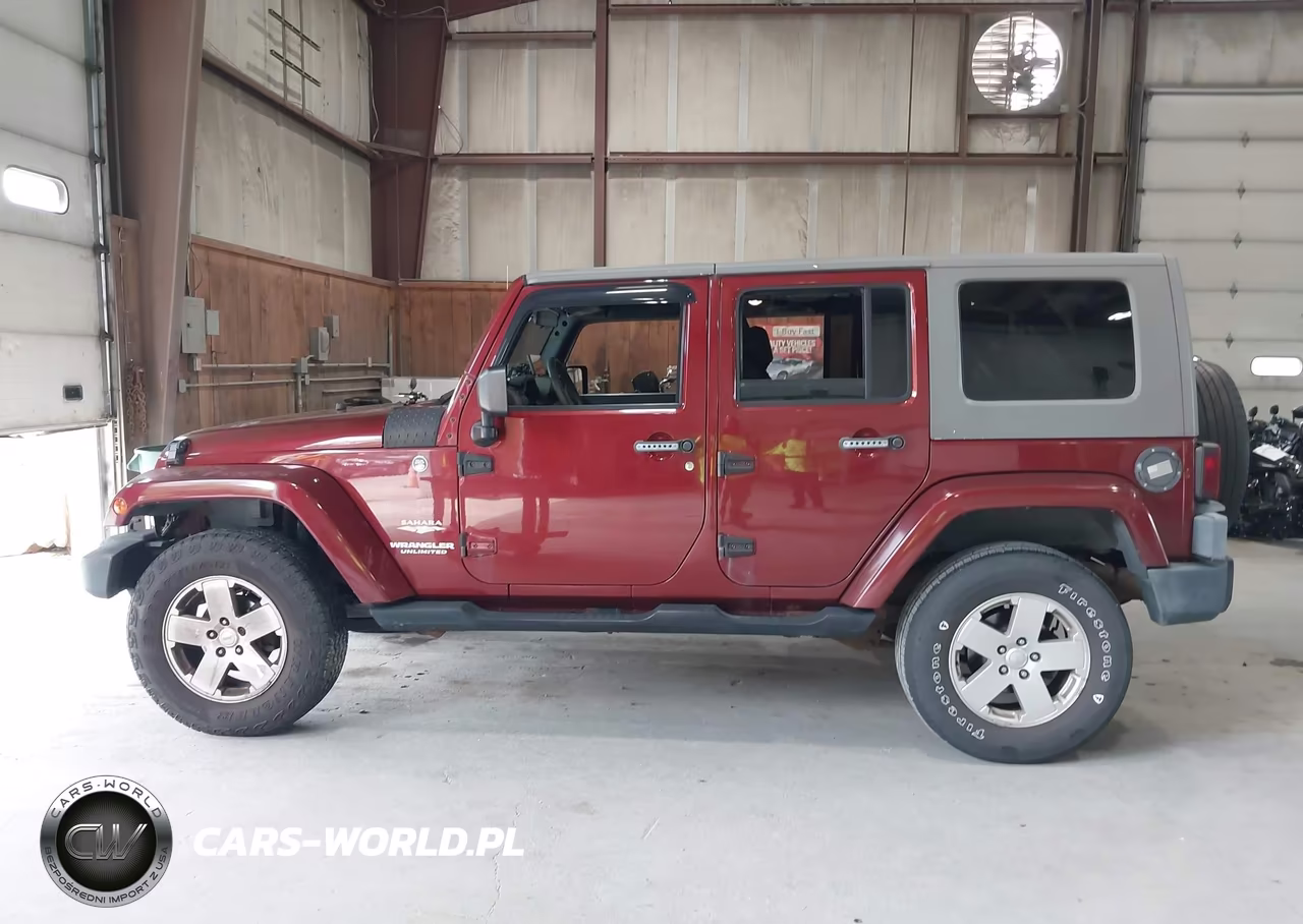 2007 Jeep Wrangler Unlimited Sahara VIN:1J4GA59177L113273 - 14