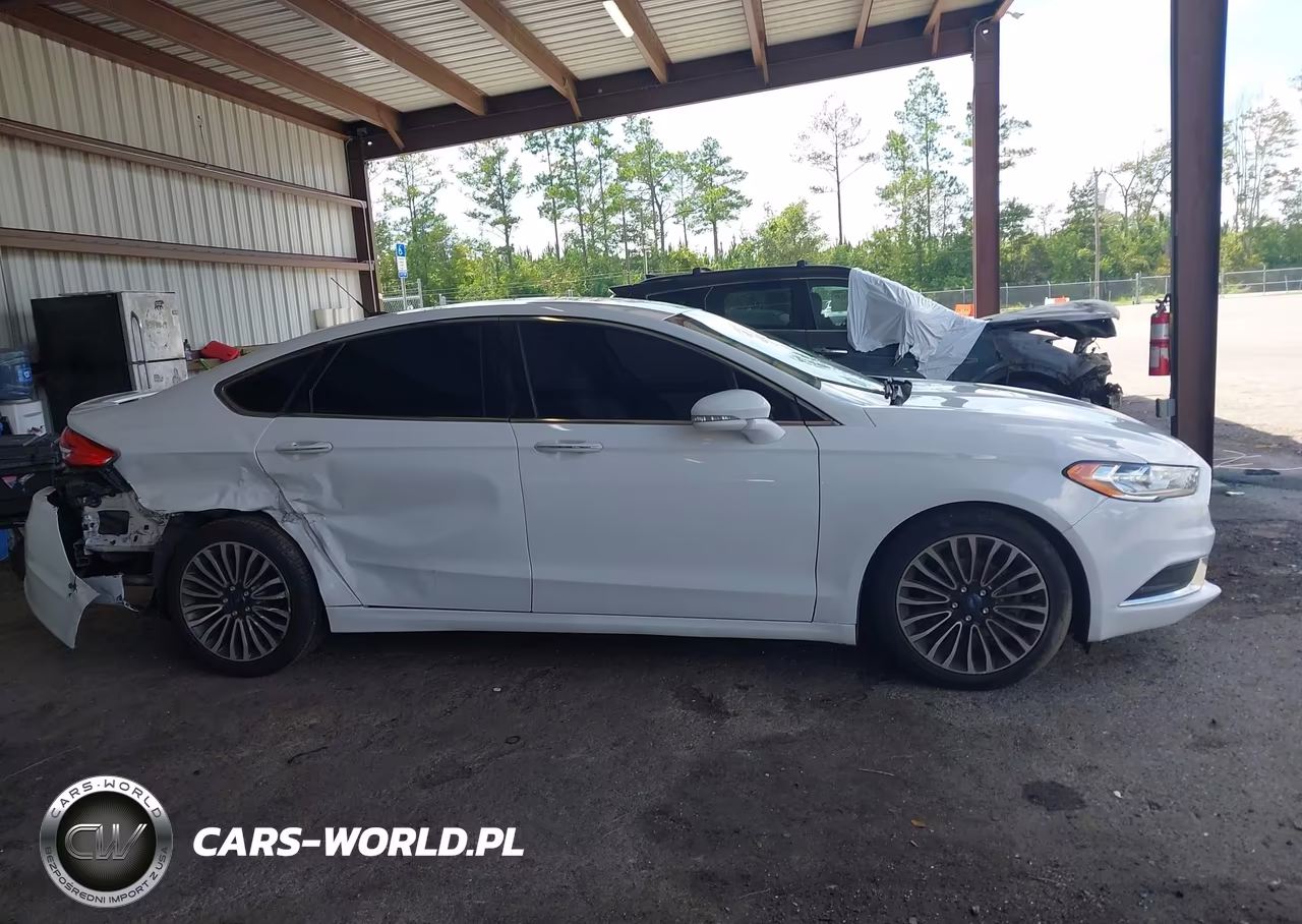 2017 Ford Fusion Titanium VIN:3FA6P0K98HR115562 - 13