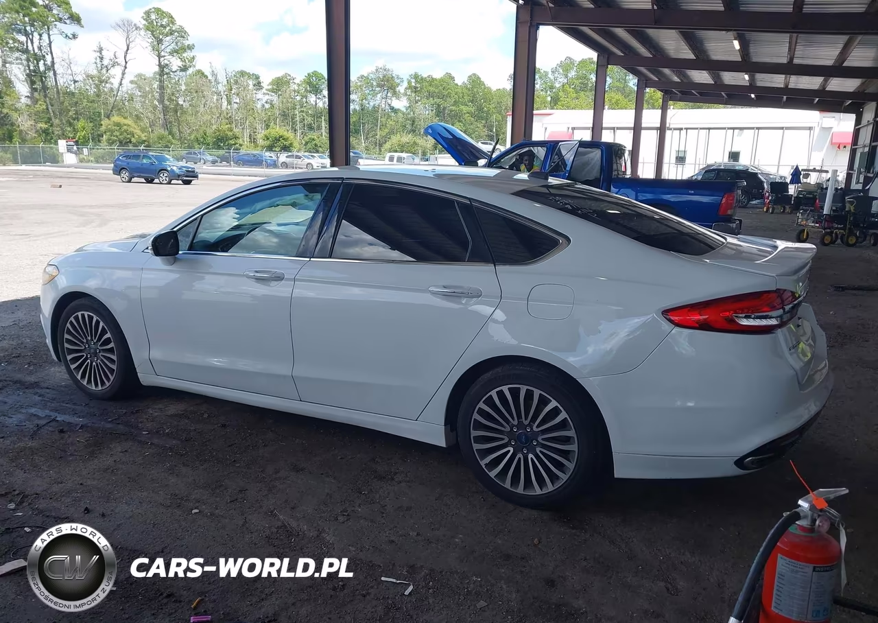 2017 Ford Fusion Titanium VIN:3FA6P0K98HR115562 - 14