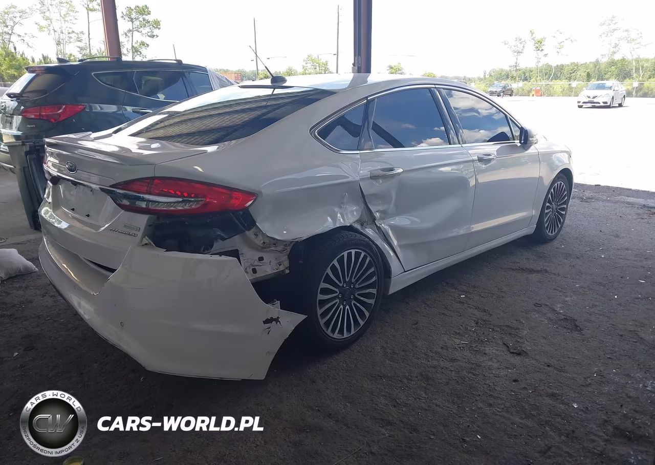 2017 Ford Fusion Titanium VIN:3FA6P0K98HR115562 - 4