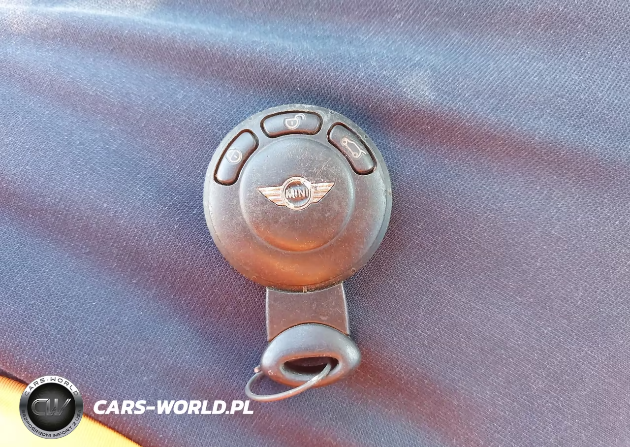 2009 Mini Cooper VIN:WMWMF33509TT69698 - 11
