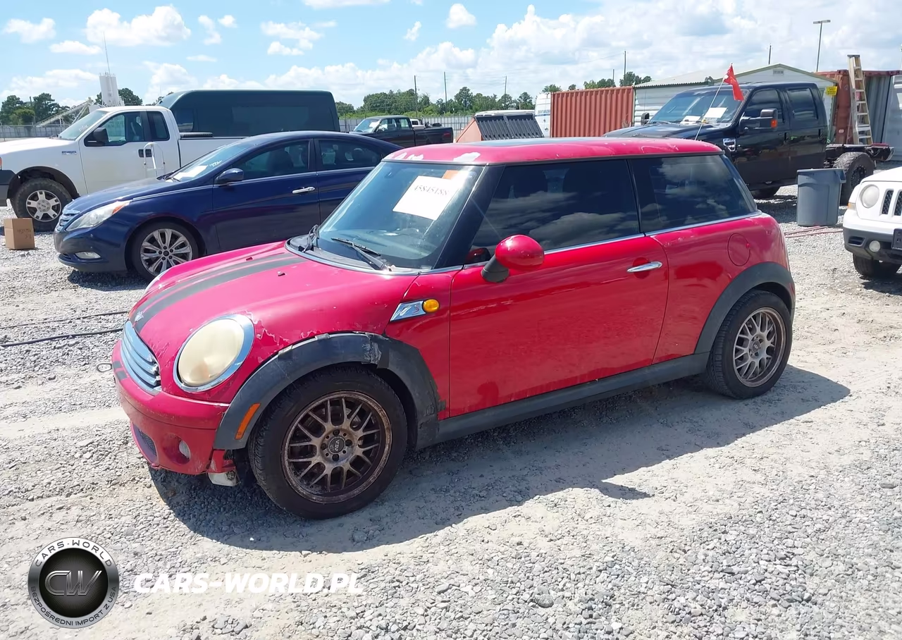 2009 Mini Cooper VIN:WMWMF33509TT69698 - 2