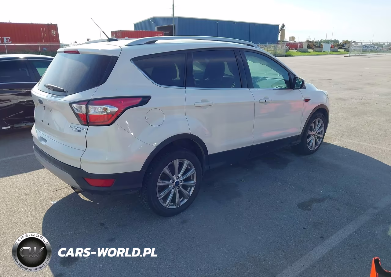 2017 Ford Escape Titanium VIN:1FMCU9J94HUD41131 - 4