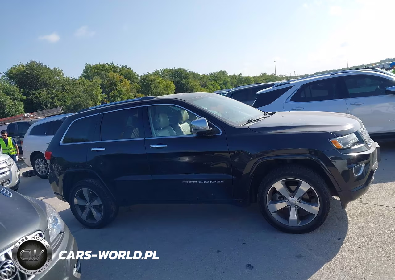 2015 Jeep Grand Cherokee Overland VIN:1C4RJFCG0FC100199 - 13