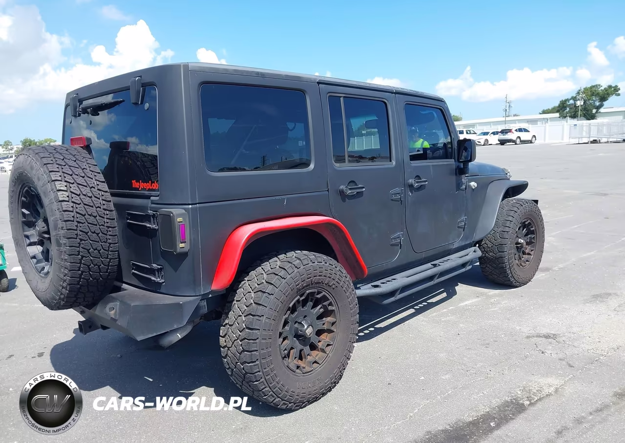 2014 Jeep Wrangler Unlimited Sport VIN:1C4HJWDG4EL113613 - 4
