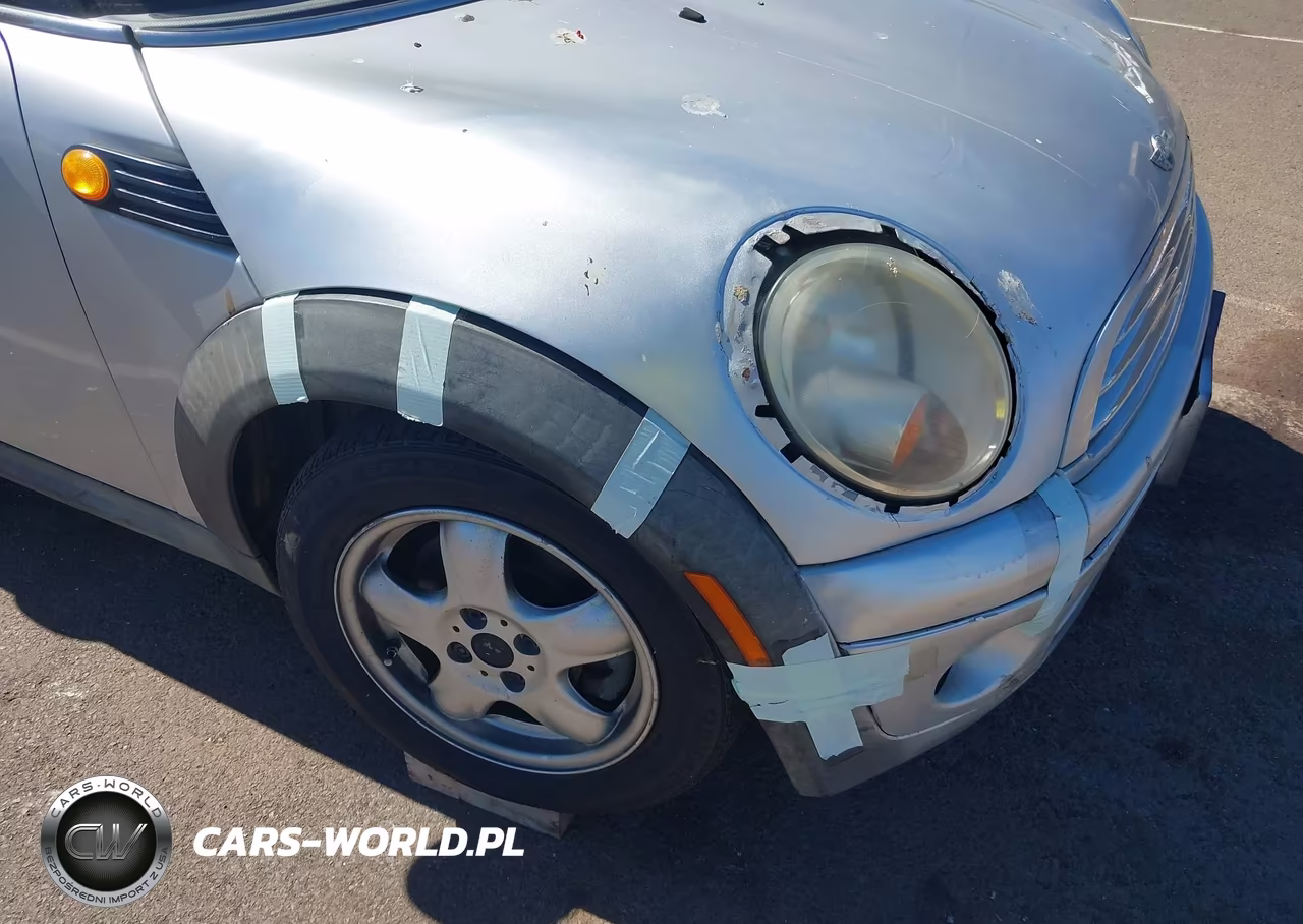 2007 Mini Cooper VIN:WMWMF33517TT57525 - 11