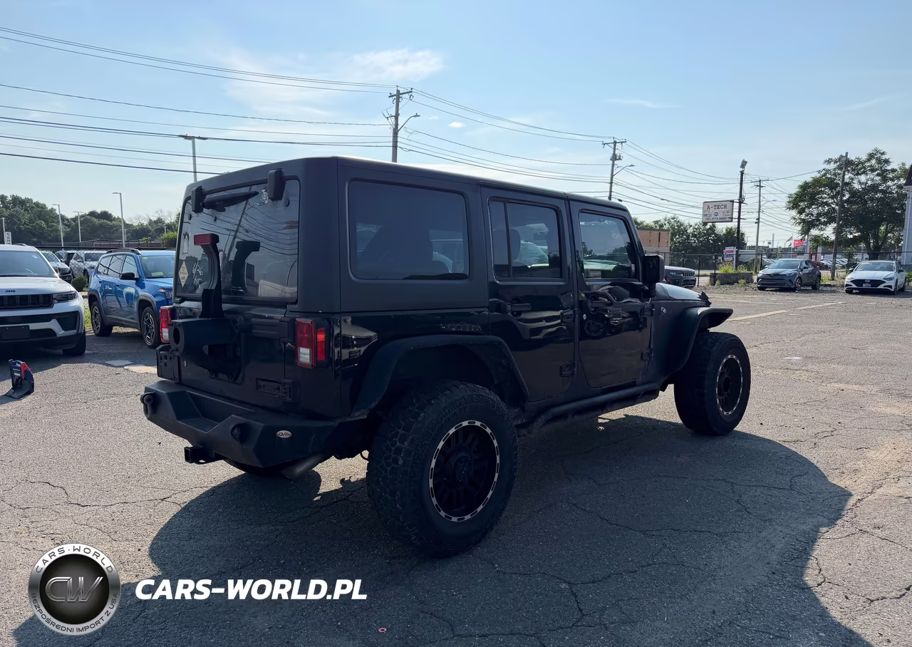 2016 Jeep Wrangler Unlimited Sport VIN:1C4BJWDG3GL194273 - 4