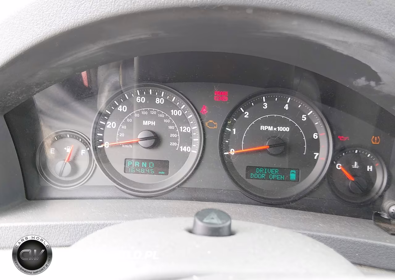 2005 Jeep Grand Cherokee Laredo VIN:1J4GR48K85C504216 - 7