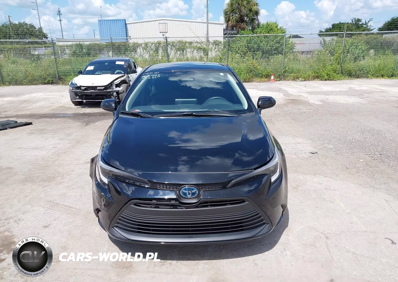 2025 Toyota Corolla Hybrid Le VIN:JTDBCMFE4S3104972 - 12
