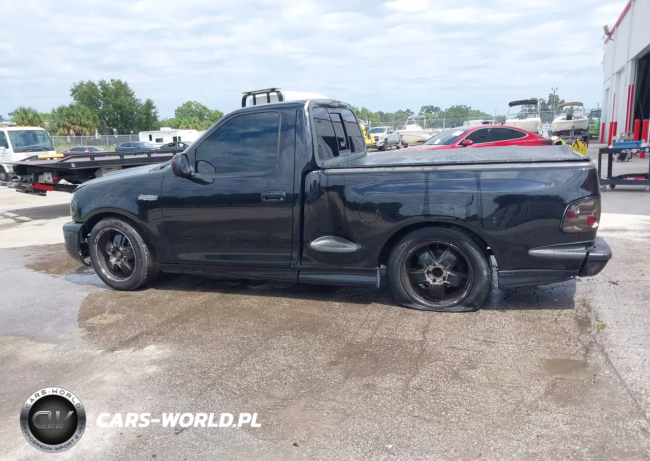 2003 Ford F-150 Lightning VIN:2FTRF07363CA77202 - 14