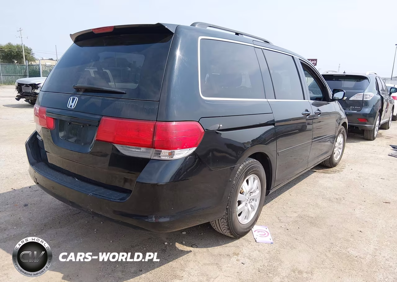 2010 Honda Odyssey Ex-L VIN:5FNRL3H75AB096129 - 4