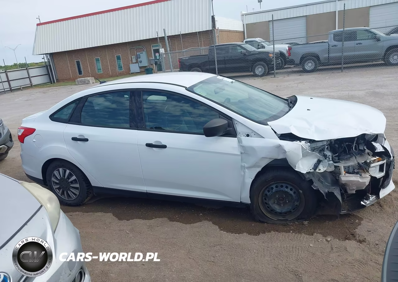2013 Ford Focus S VIN:1FADP3E21DL323265 - 14