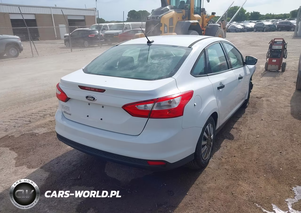 2013 Ford Focus S VIN:1FADP3E21DL323265 - 4