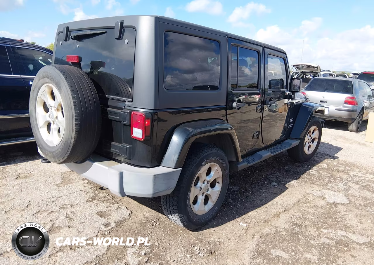 2013 Jeep Wrangler Unlimited Sahara VIN:1C4BJWEGXDL677169 - 4