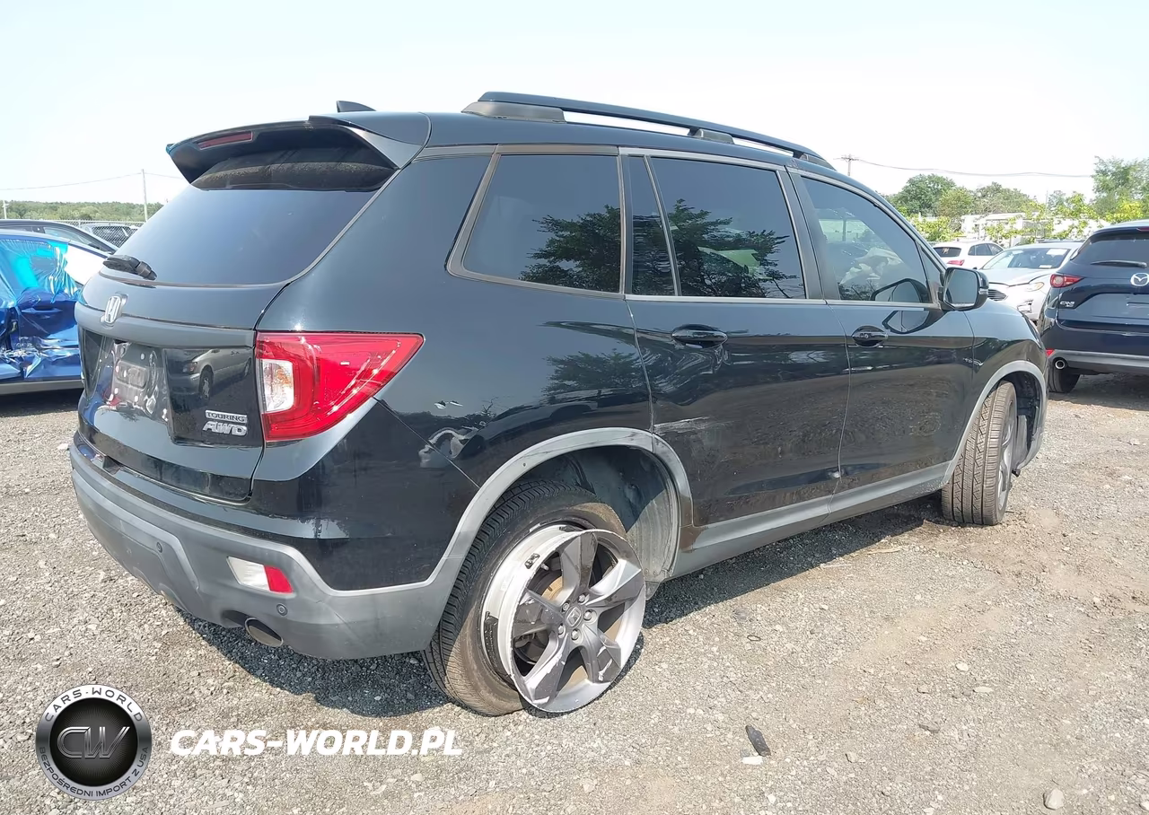 2019 Honda Passport Touring VIN:5FNYF8H91KB009345 - 4