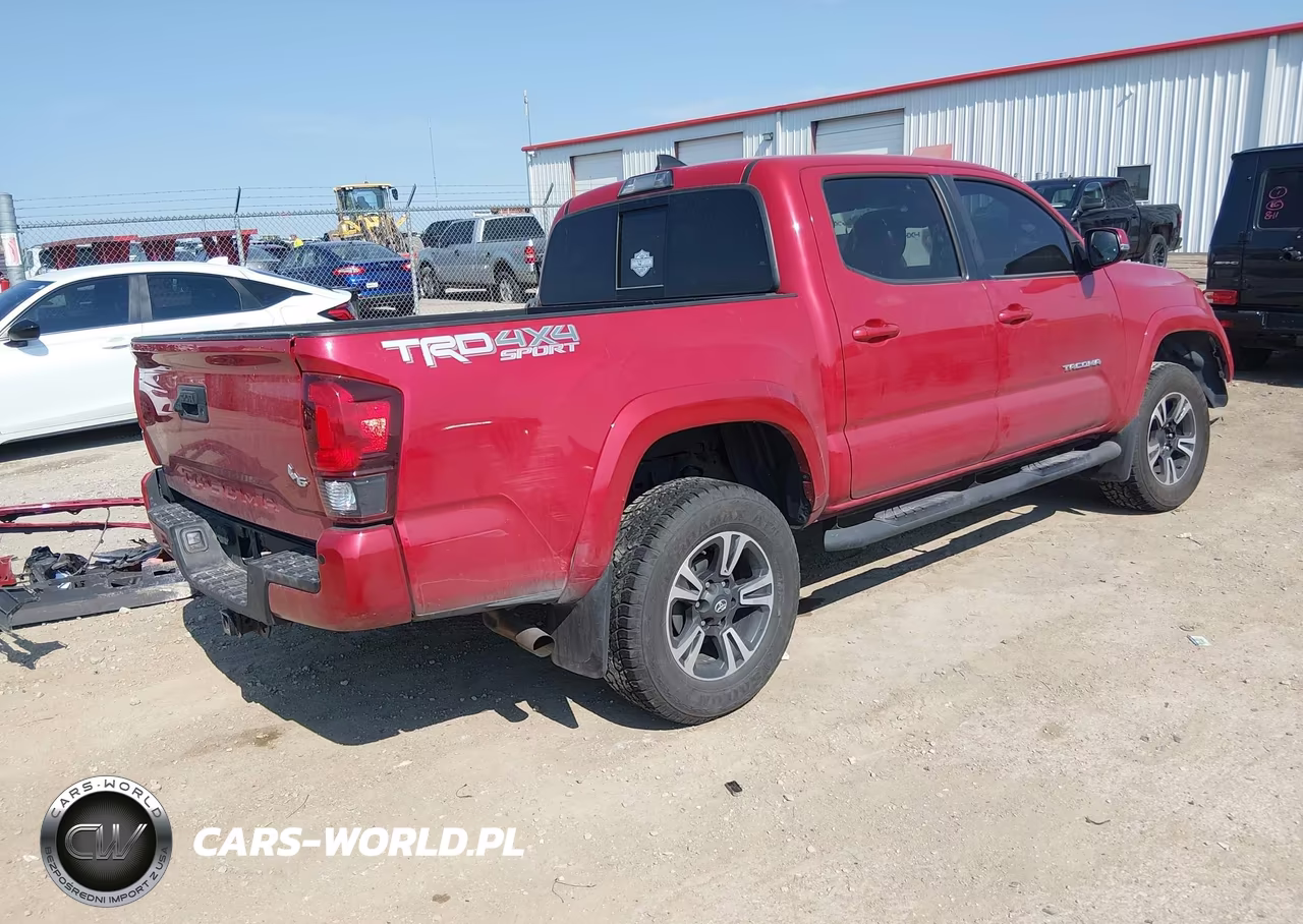 2018 Toyota Tacoma VIN:3TMCZ5AN1JM171882 - 4