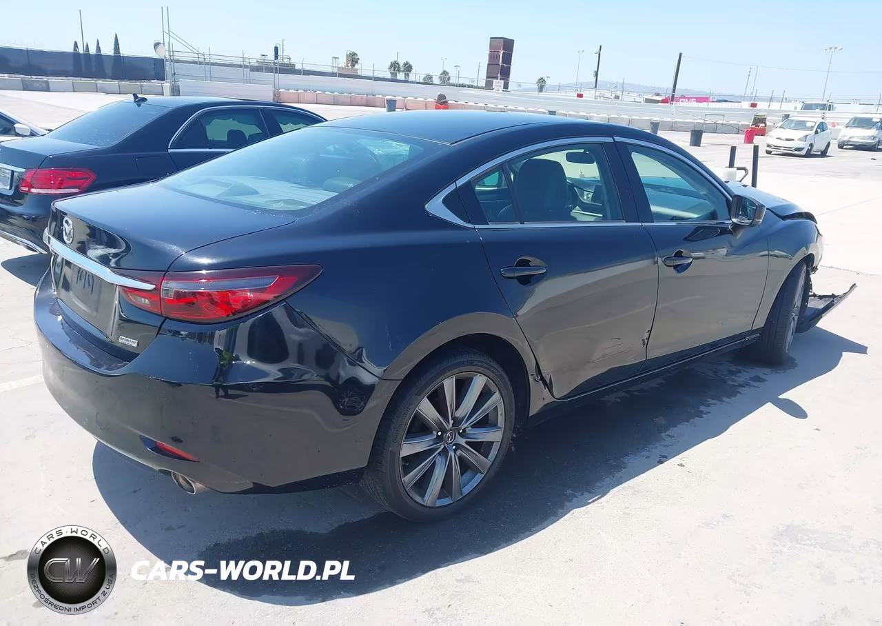 2018 Mazda Mazda6 Touring VIN:JM1GL1VM2J1312369 - 4