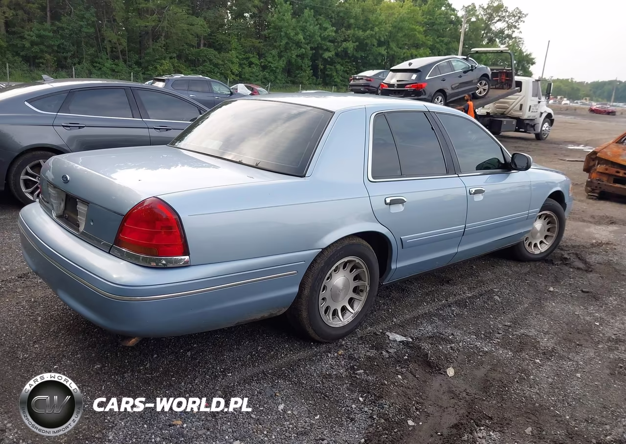 1999 Ford Crown Victoria Lx VIN:2FAFP74W2XX123359 - 4