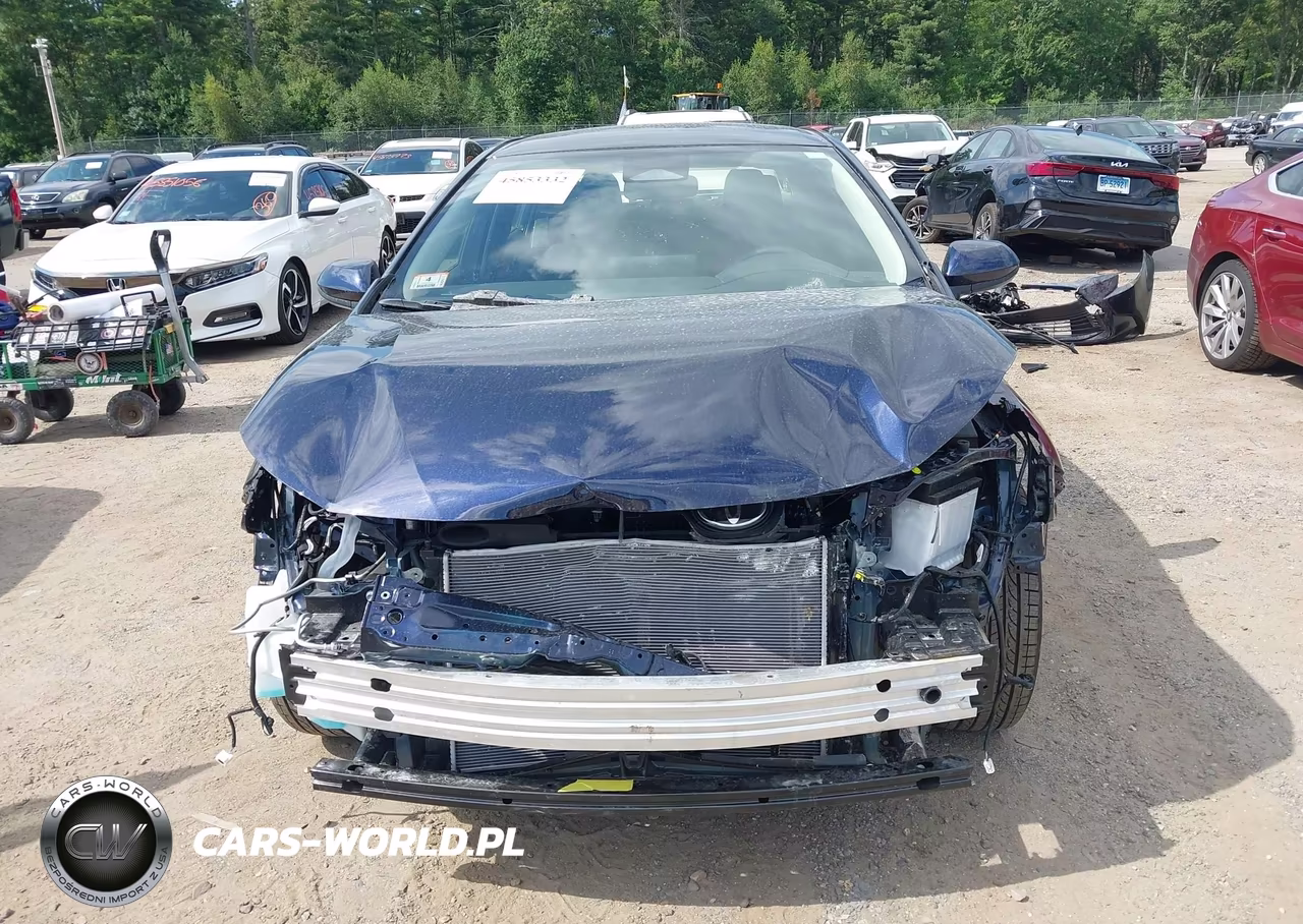 2026 Toyota Corolla Hybrid Hybrid Le VIN:JTDBDMHE1T3033824 - 13