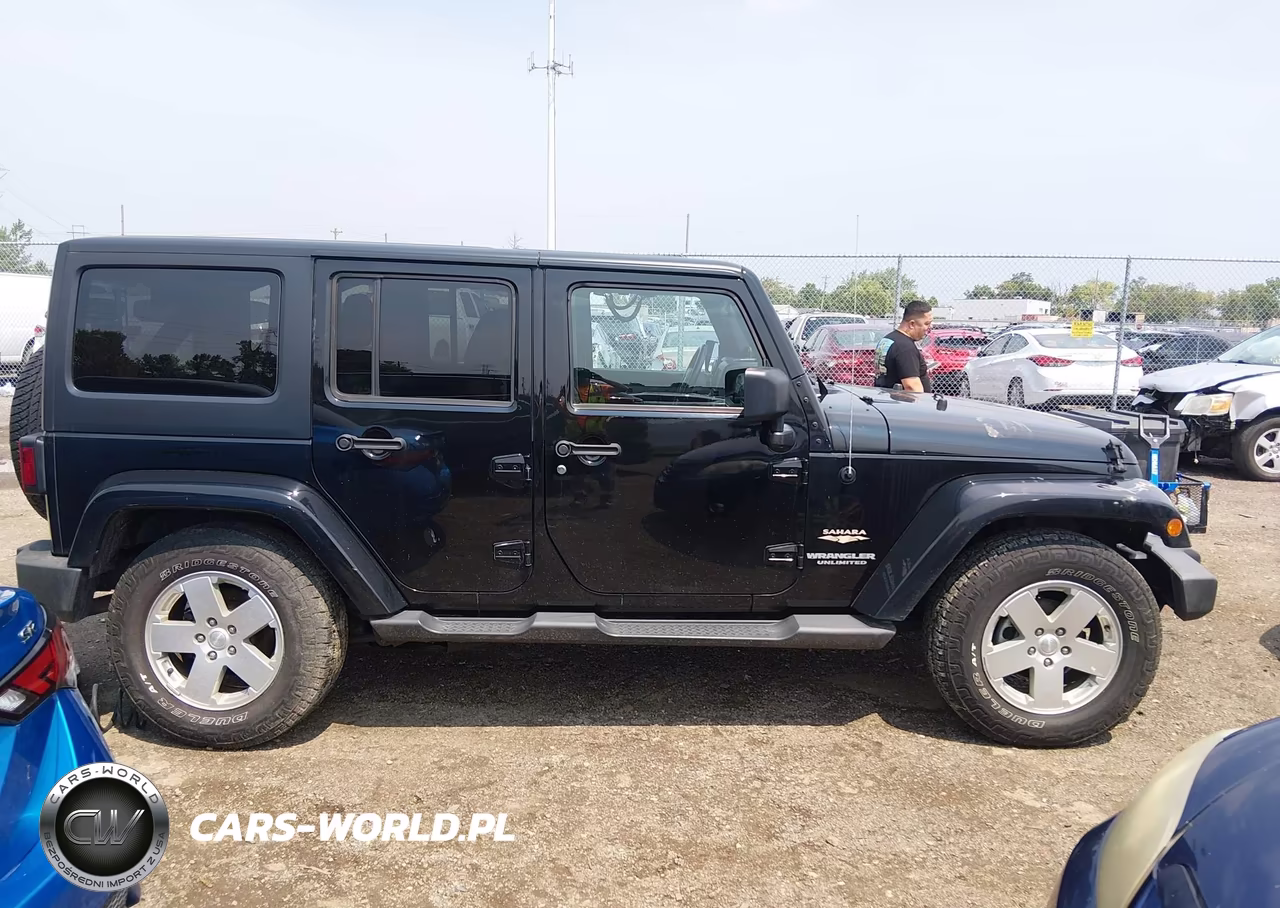 2012 Jeep Wrangler Unlimited Sahara VIN:1C4HJWEGXCL184326 - 14