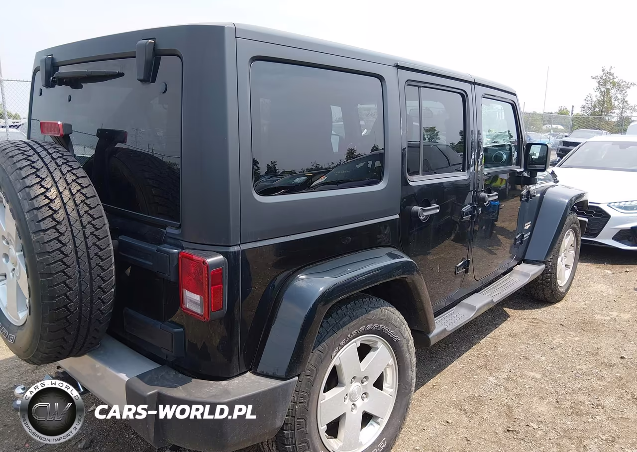 2012 Jeep Wrangler Unlimited Sahara VIN:1C4HJWEGXCL184326 - 4