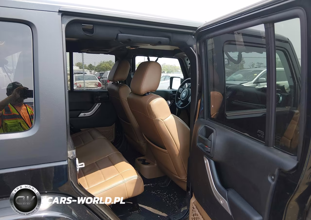 2012 Jeep Wrangler Unlimited Sahara VIN:1C4HJWEGXCL184326 - 8
