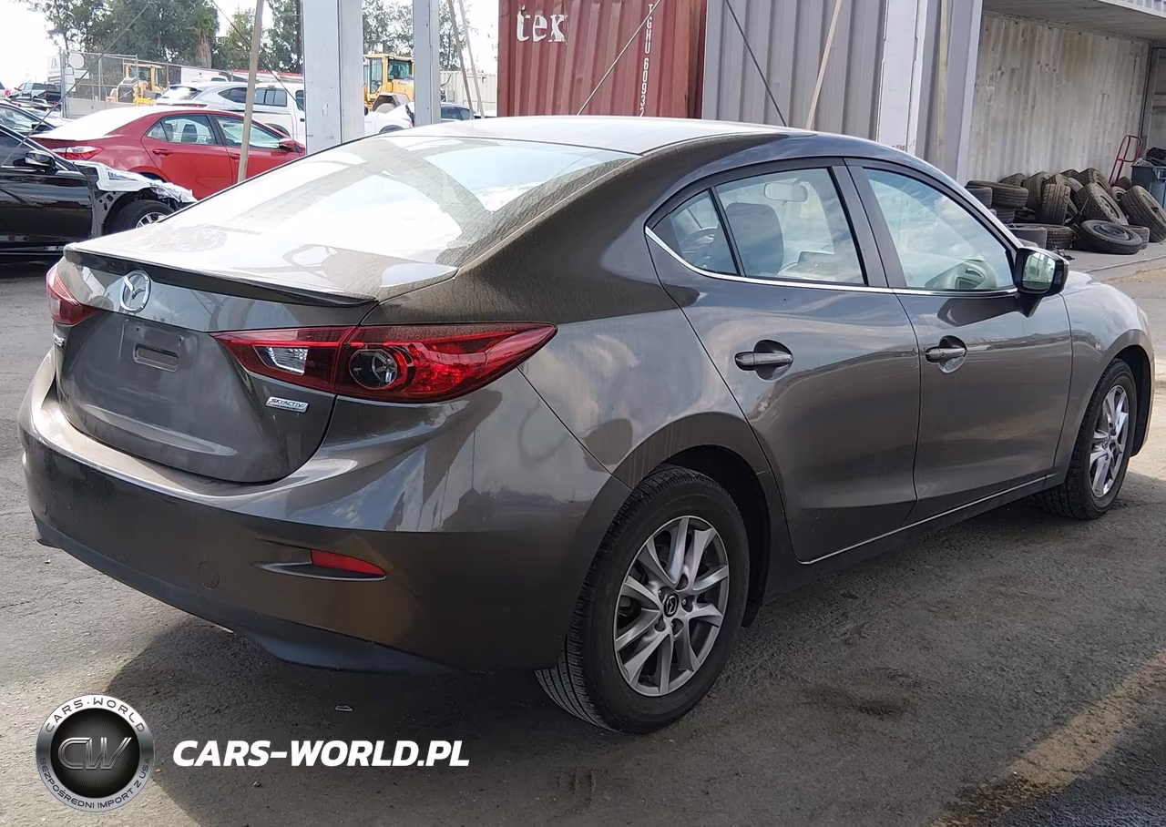 2014 Mazda Mazda3 I Touring VIN:JM1BM1V72E1110591 - 4