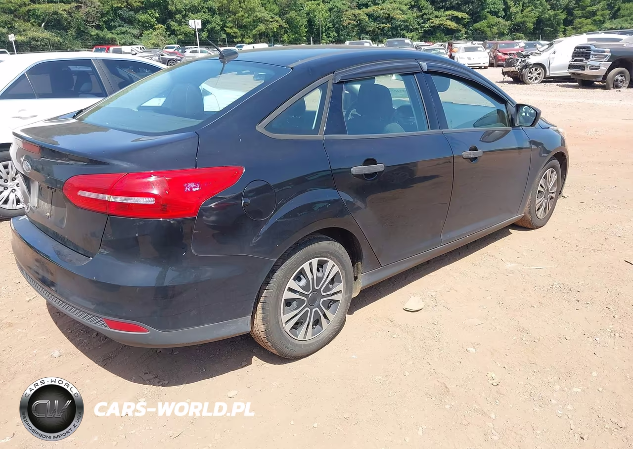 2017 Ford Focus S VIN:1FADP3E25HL262184 - 4