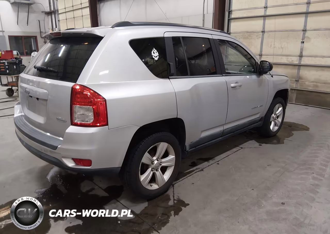 2011 Jeep Compass VIN:1J4NT1FB2BD192166 - 4
