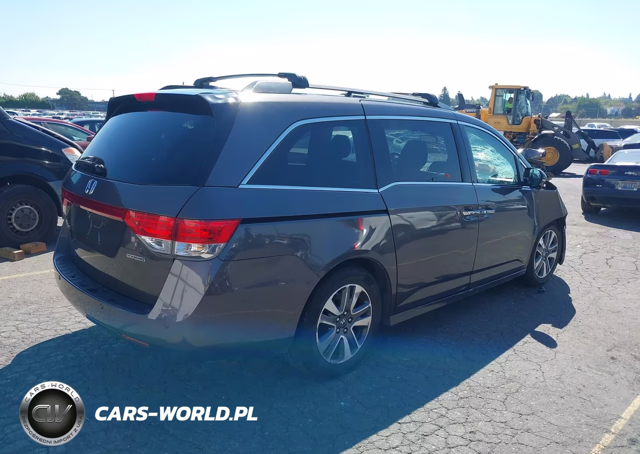 2016 Honda Odyssey Touring VIN:5FNRL5H99GB108286 - 4