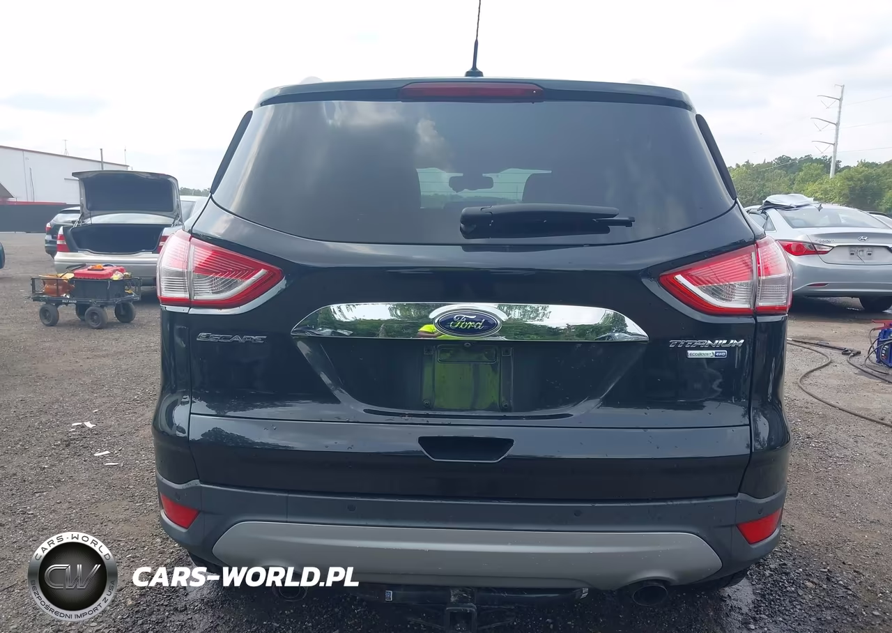 2015 Ford Escape Titanium VIN:1FMCU9J95FUA56600 - 16