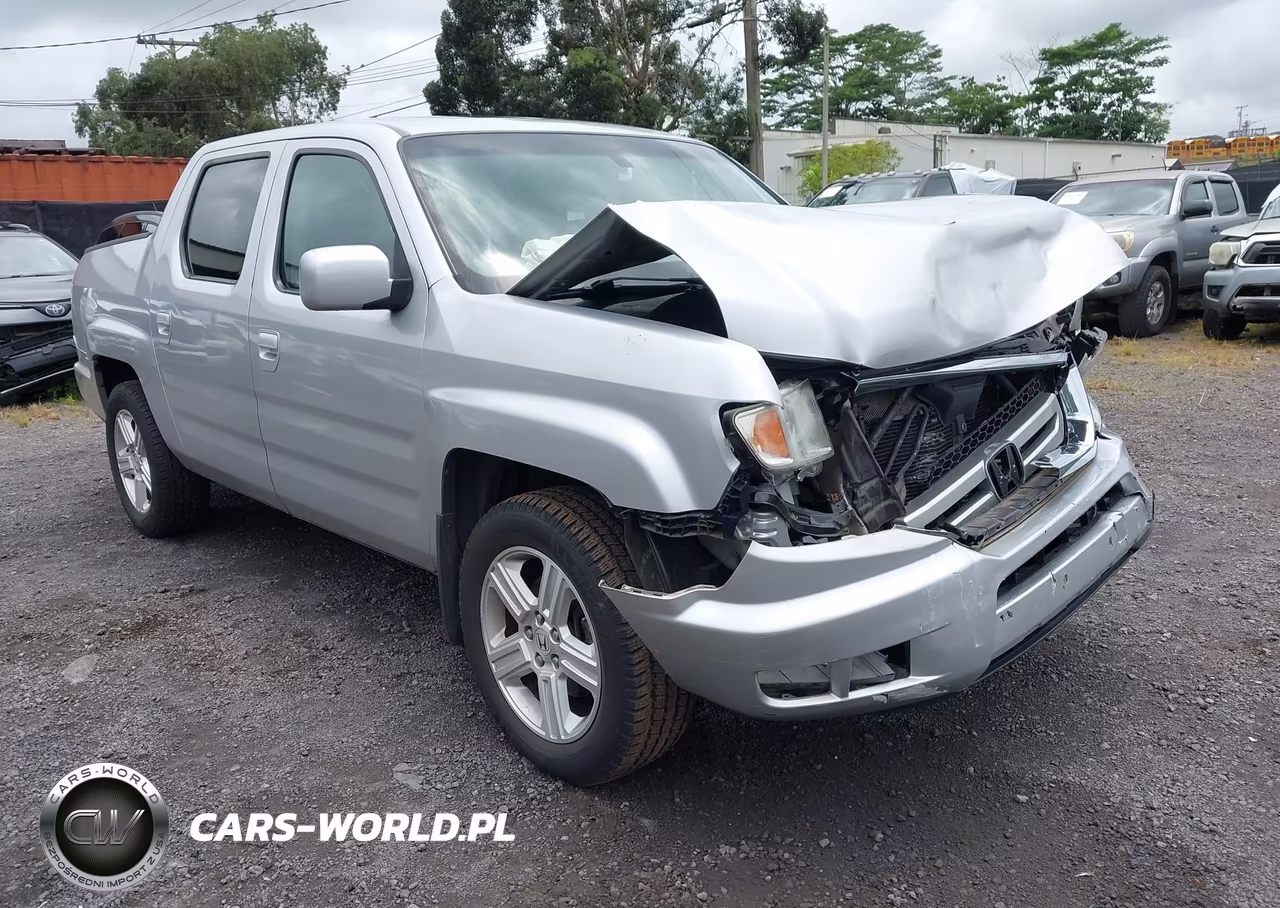 2010 Honda Ridgeline Rtl VIN:5FPYK1F59AB013670 - 1