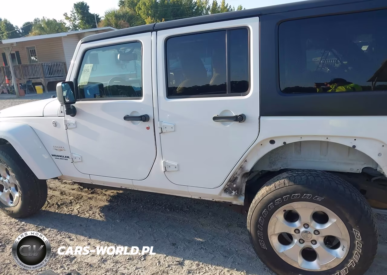 2013 Jeep Wrangler Unlimited Sahara VIN:1C4BJWEG1DL530612 - 14