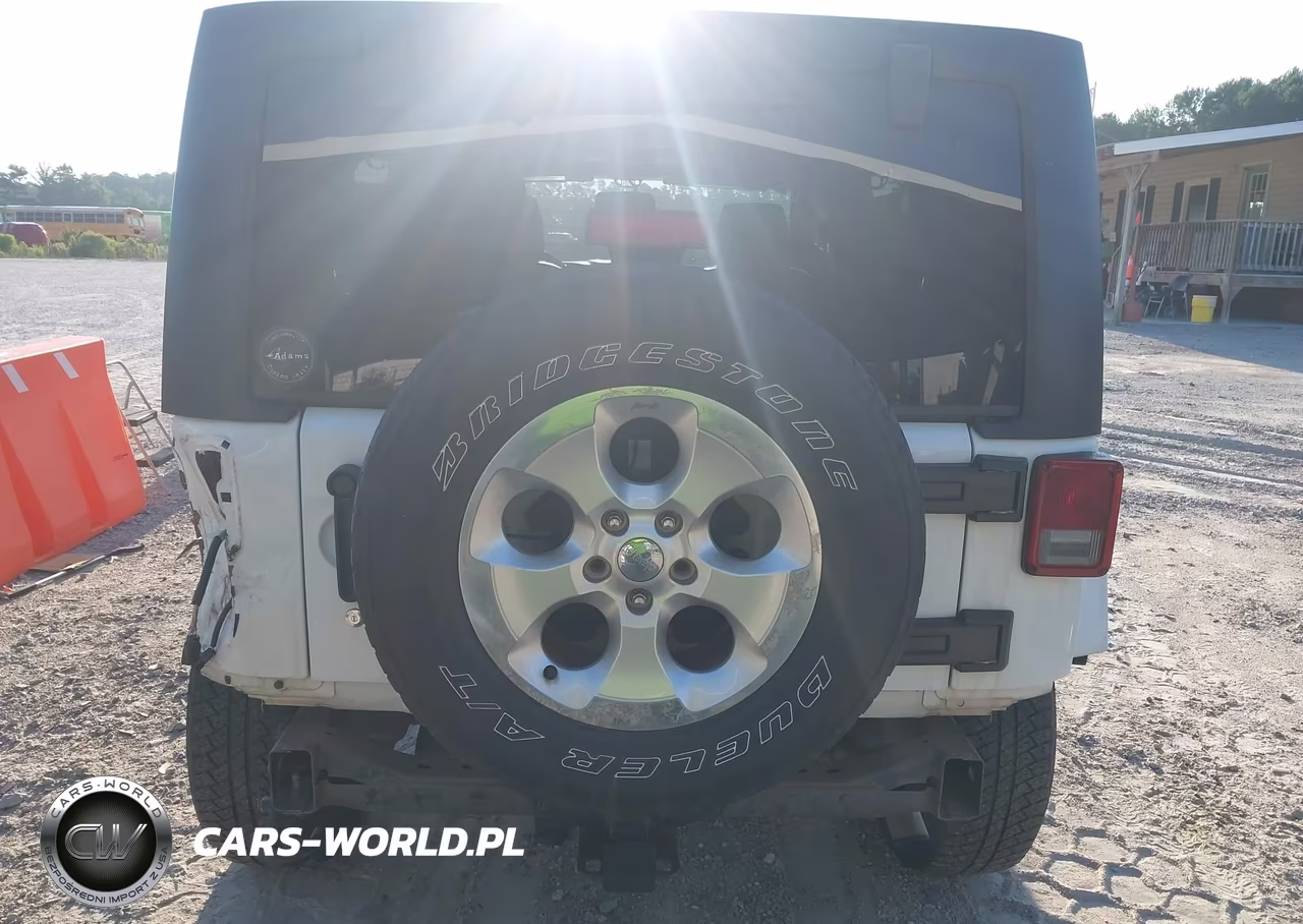 2013 Jeep Wrangler Unlimited Sahara VIN:1C4BJWEG1DL530612 - 16