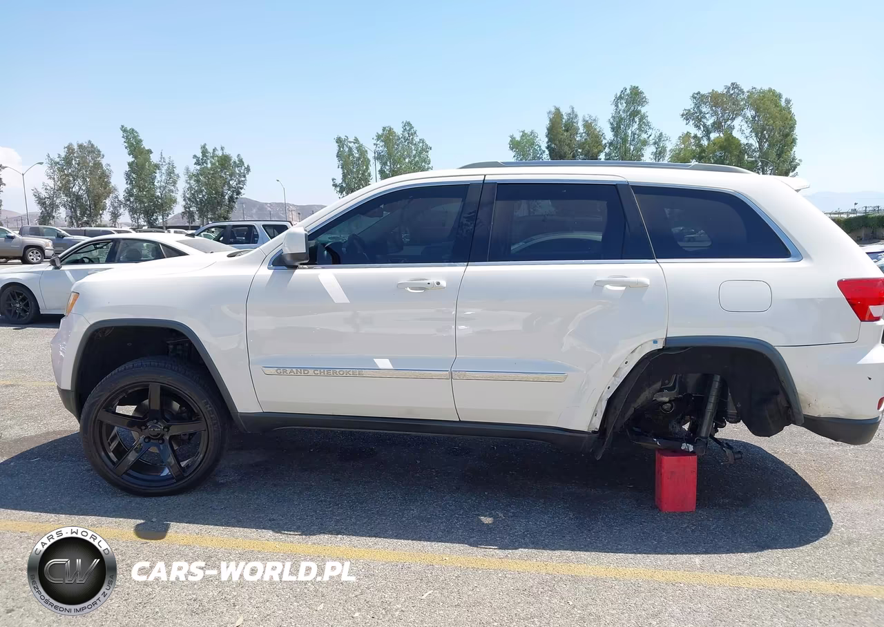 2012 Jeep Grand Cherokee Laredo VIN:1C4RJEAG3CC239977 - 16