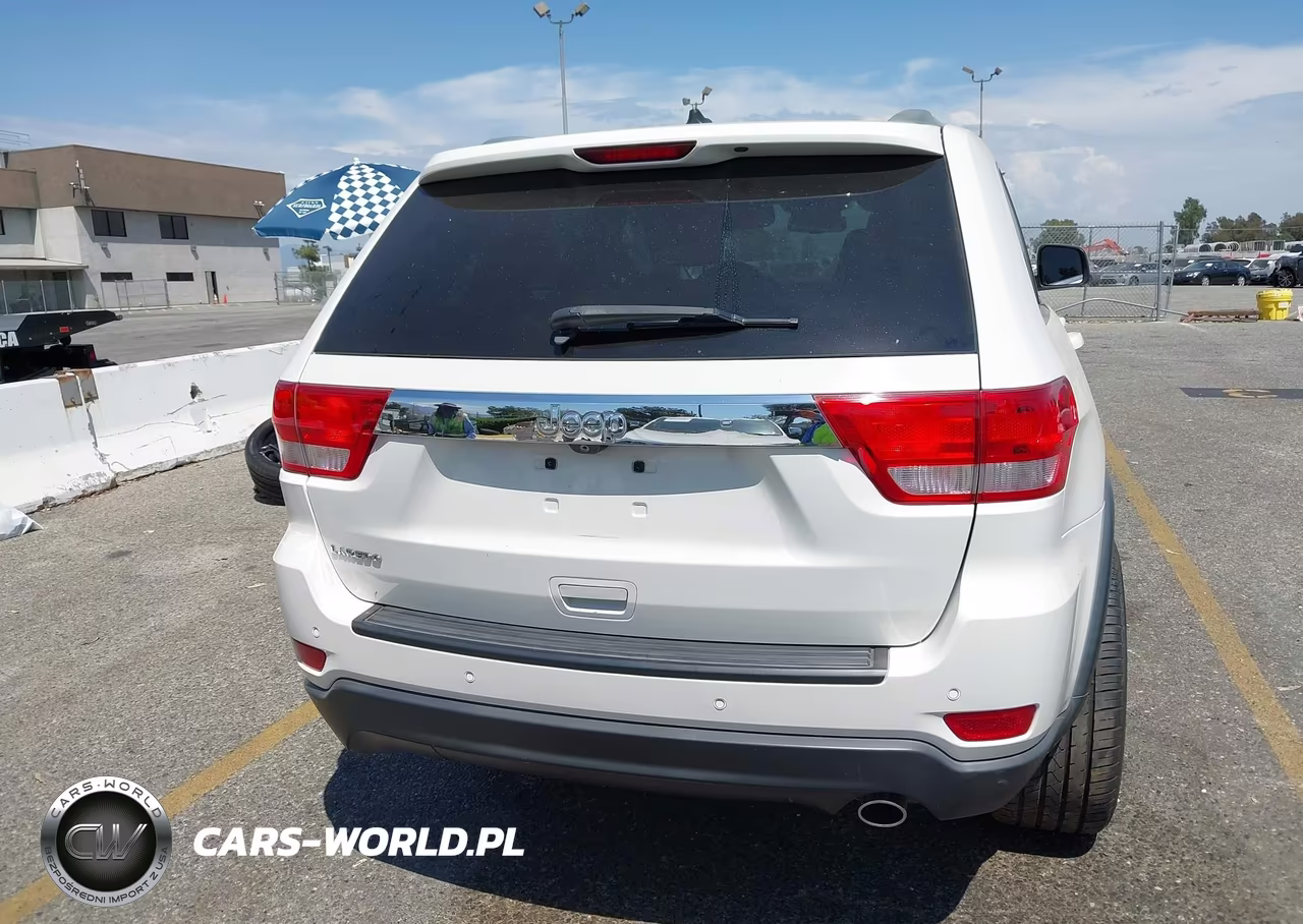 2012 Jeep Grand Cherokee Laredo VIN:1C4RJEAG3CC239977 - 18