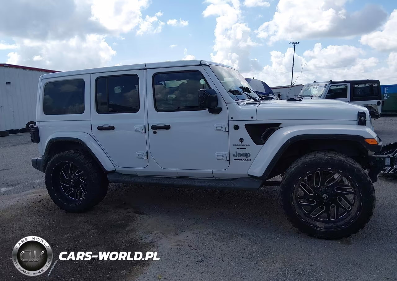 2019 Jeep Wrangler Unlimited Sahara 4X4 VIN:1C4HJXEN3KW510663 - 14