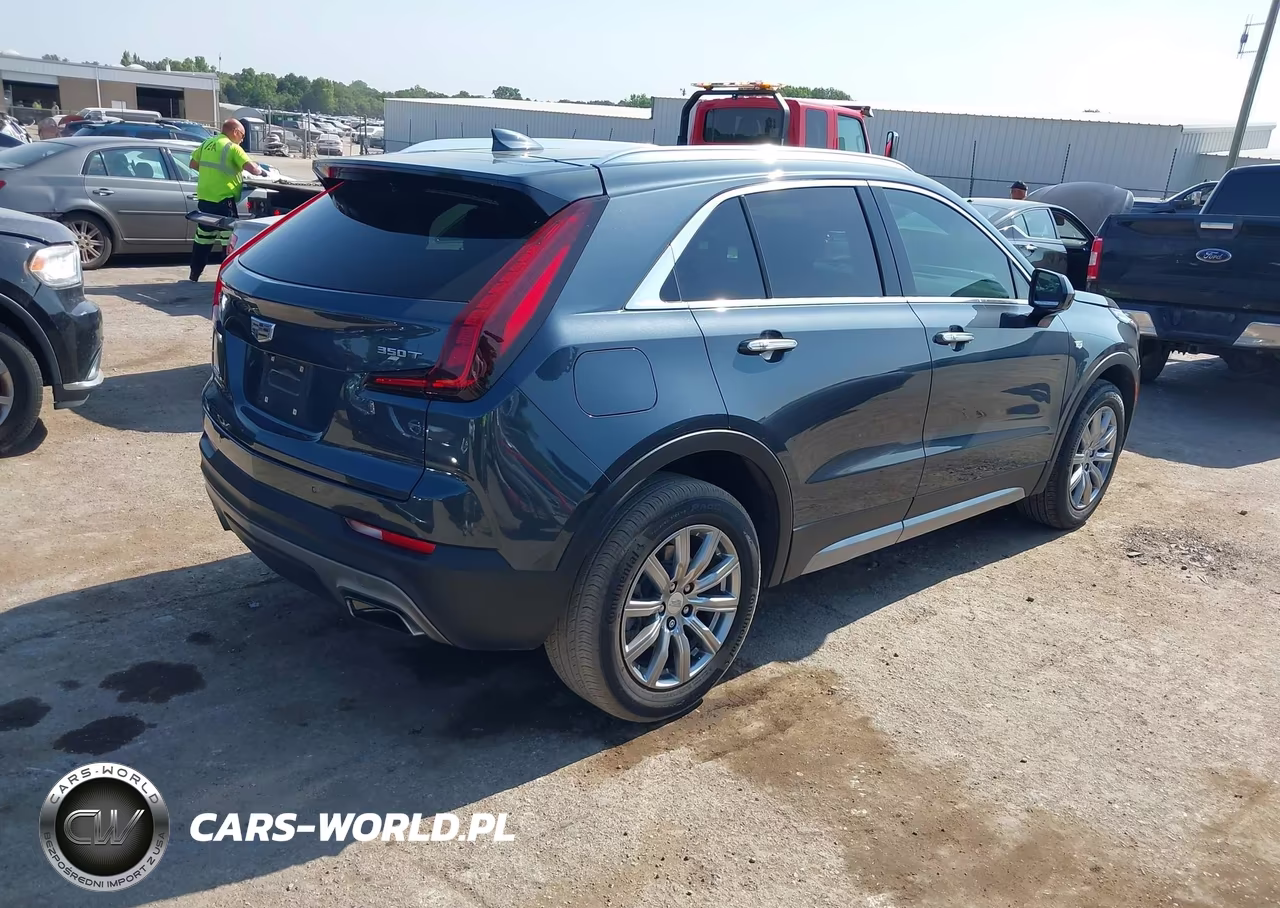 2020 Cadillac Xt4 Fwd Premium Luxury VIN:1GYFZCR43LF067680 - 4