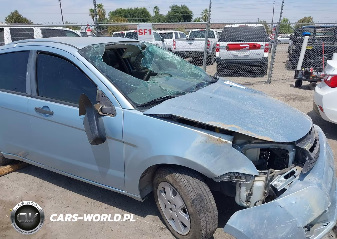2009 Ford Focus S VIN:1FAHP34N69W211404 - 13