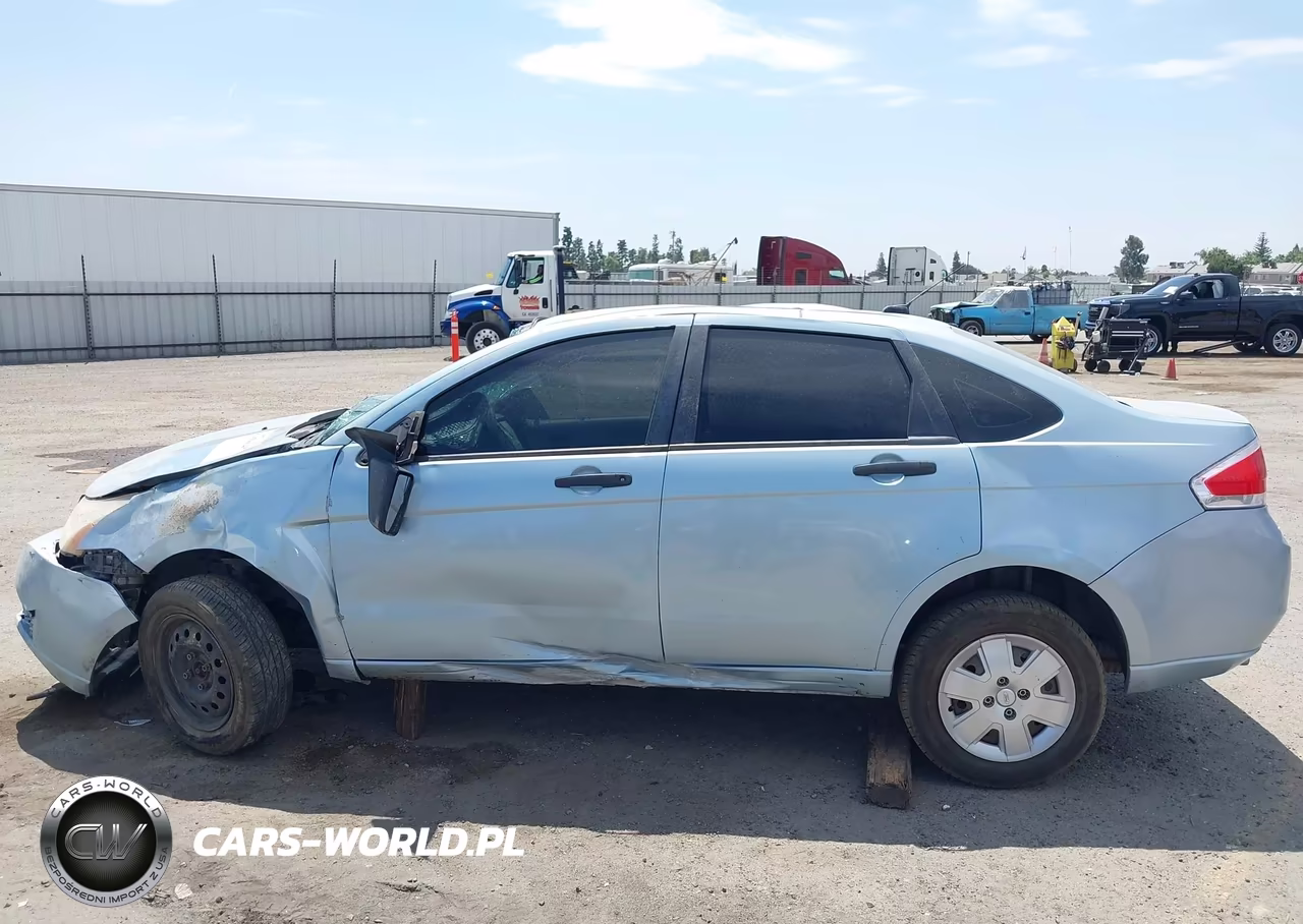 2009 Ford Focus S VIN:1FAHP34N69W211404 - 18