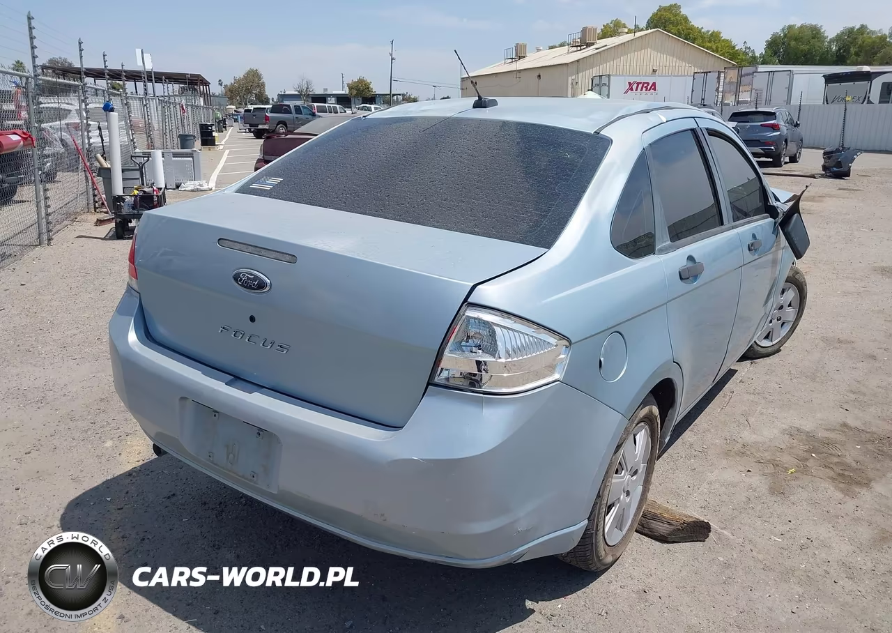 2009 Ford Focus S VIN:1FAHP34N69W211404 - 4