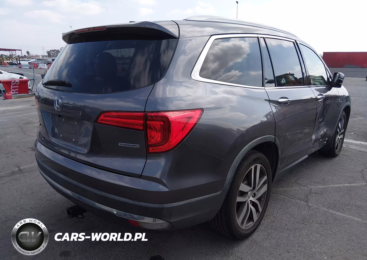 2017 Honda Pilot Touring VIN:5FNYF5H94HB011677 - 4
